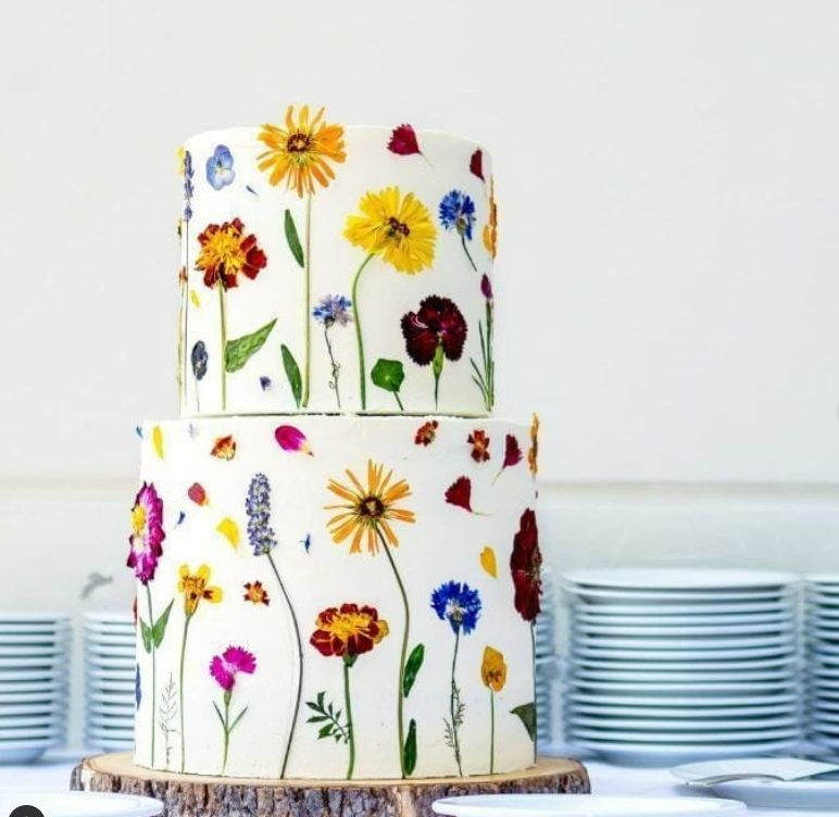Bruidstaart, Taart decoratie geperste bloemen. Floral Delight eetbare bloemen