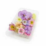 Pastel kleurige eetbare bloemen. Bruiloft, Bruidstaart, champagne, cupcakes, dripcake, lieve kleuren. Floral Delight